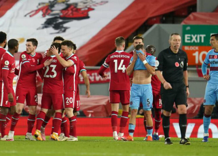 Salah y Jota dan al Liverpool el liderato y un récord